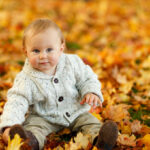 boy in park in autumn | Toddlebabes - Learn to Play - Play to Learn